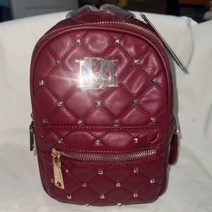 Badgley Mischka Burgundy Quilted Mini Backpack with Gold Accents